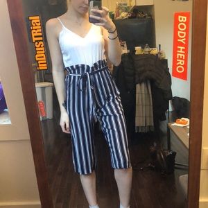 White cami, navy blue striped pants romper